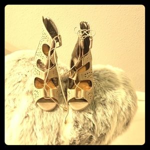 Gray straps bootie heels.